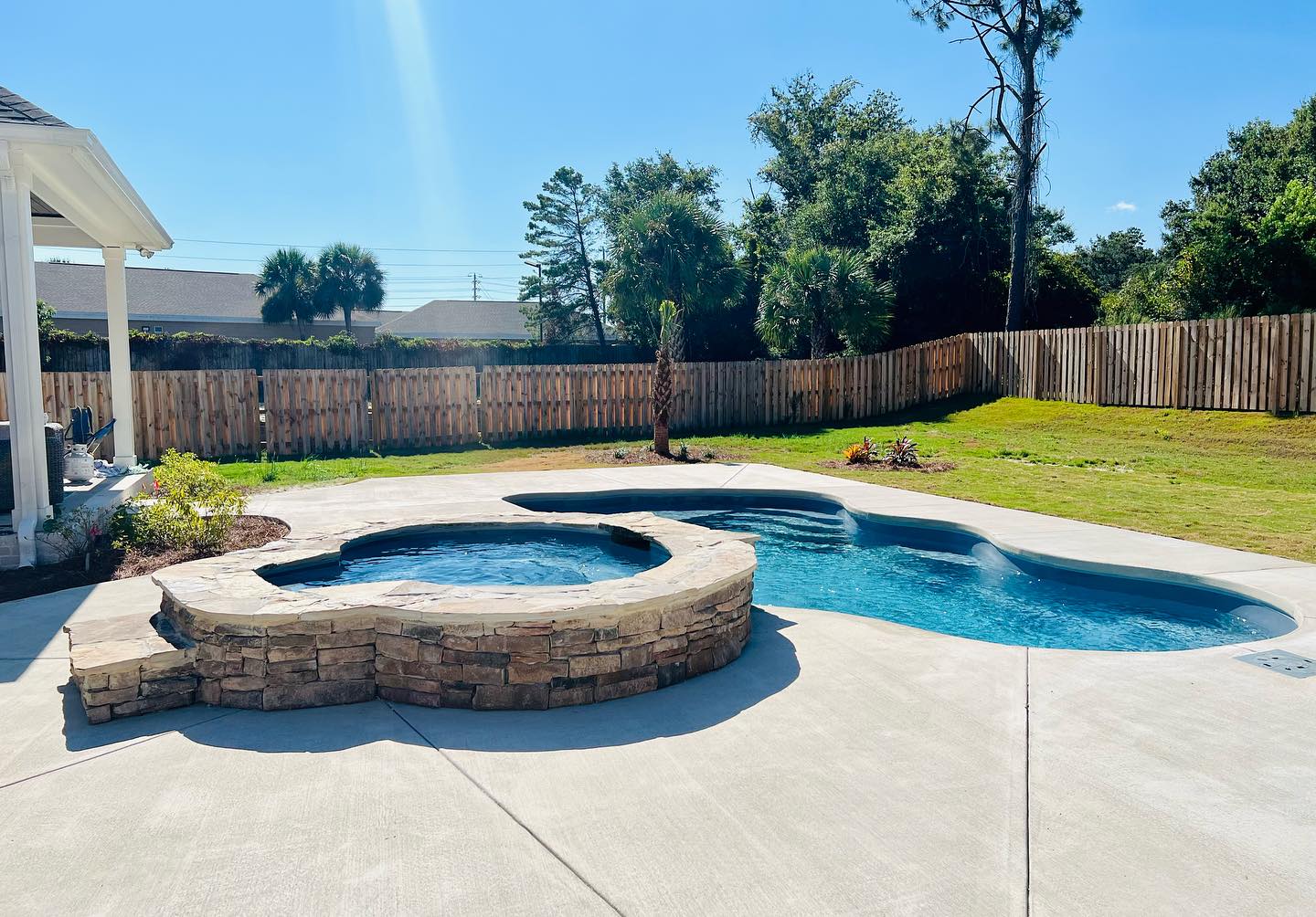 Fiberglass Billabong Splash pool with oval spa showcasing smooth finish and elegant design